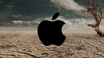 Apple logo in front of dryland