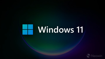 An image with a colorful Windows 11 logo and dimmed background