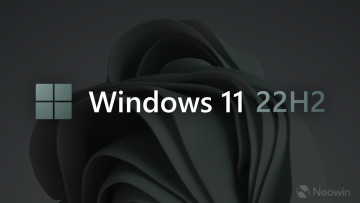 An image with a colorful Windows 11 22H2 logo and a dimmed background