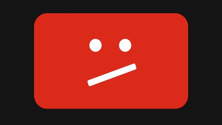 A YouTube frown on a dark background