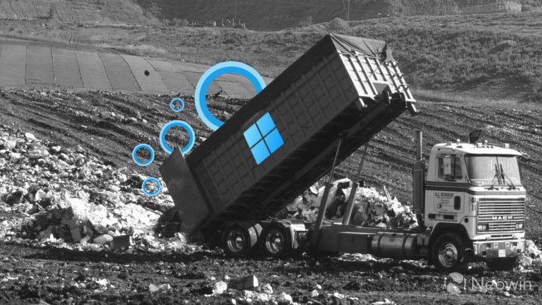 A dumpster truck offloading a bunch of Cortana logos into a landfill