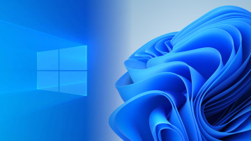 A picture with Windows 10 and Windows 11 stock wallpapers blending