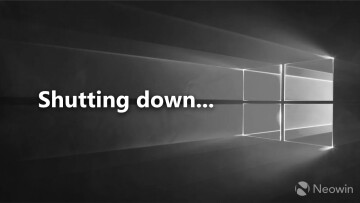 Windows 10 logo on gray with a text saying Shutting down